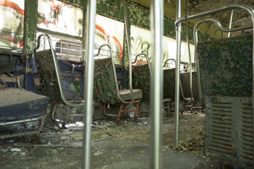 Aisle and seats of abandoned trolley car