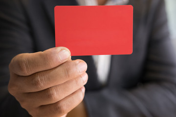 business man holding a credit card for online shopping, purchase goods from internet, make payment on bank website