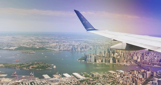 An aerial view of lower Manhattan as seen from the widow of a landing jetliner.  	
