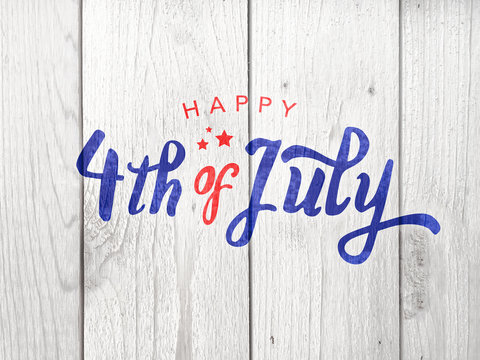 Happy 4th of July Typography Over Distressed Wood Background