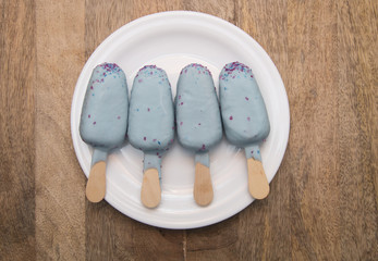 Blue Cakesicles Popsicles  with caramel sparkling 