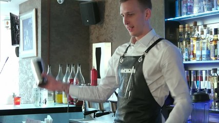 Juggling bartender showing off his juggling skills