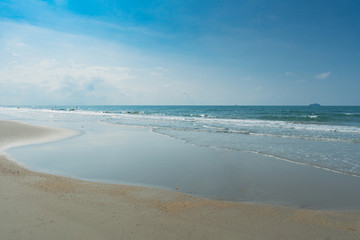 Fototapeta na wymiar Tropical beach with clear water and blue sky
