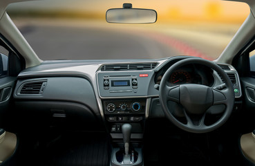 Travel in car. Element of design. the steering wheel inside of a car