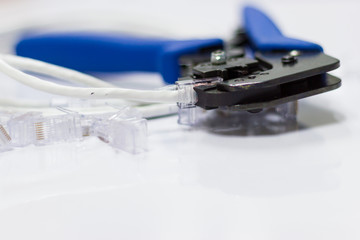 Close up rj45 network crimper close up with  blue RJ crimper 