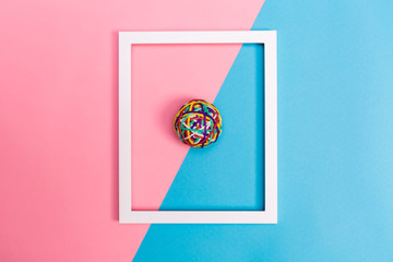 Rubber band ball with frame