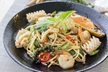 Stir-fried spicy spaghetti with seafoods or drunken spaghetti , Phad Kee Mao Spaghetti