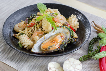 Stir-fried spicy spaghetti with seafoods or drunken spaghetti , Phad Kee Mao Spaghetti