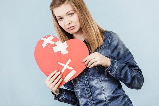 Young woman with broken heart