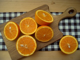 Oranges cutted and prepared for make juice.