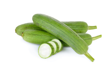 whole fresh luffa with stem on white background