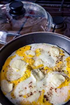 Eggs in a pan, a simple fitness breakfast.