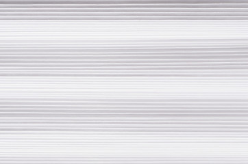Obraz premium Striped wavy white paper texture, abstract background.