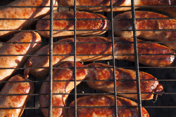 sausages on the grill. 10