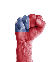 Flag of Samoa painted on human fist like victory symbol