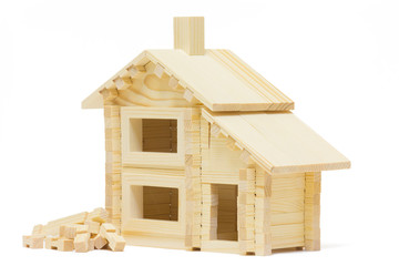 Obraz na płótnie Canvas Toy wooden house isolated on white background