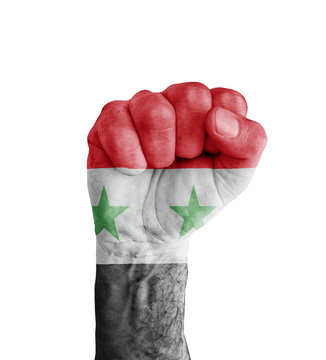Flag of Syria painted on human fist like victory symbol