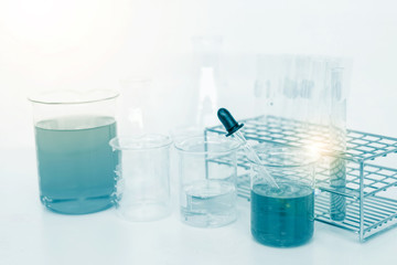 scientist hand holding laboratory test tube, science laboratory research and development concept