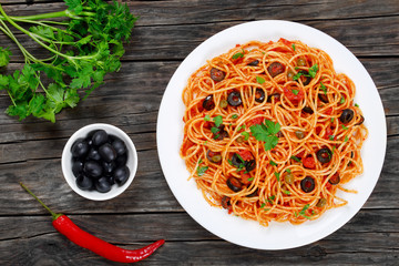 Delicious Spaghetti alla puttanesca with capers