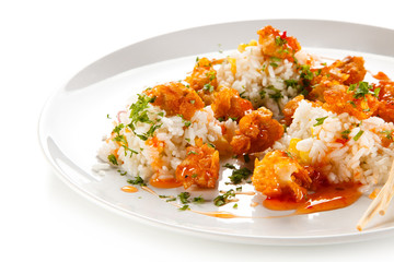 Chicken nuggets with rice on white background 