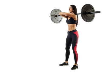 Obraz premium Young athletic brunette woman doing a squat with a barbell, loki in front of her, standing on white isolated background