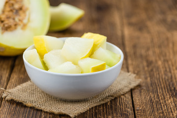 Wooden table with Honeydew Melon (selective focus)