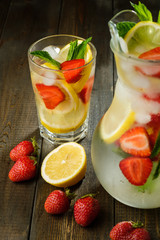 Lemonade with lemon and strawberry, mint and ice