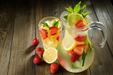 Lemonade with lemon and strawberry, mint and ice
