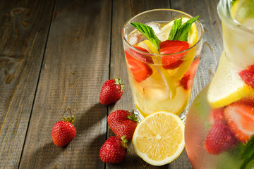 Lemonade with lemon and strawberry, mint and ice