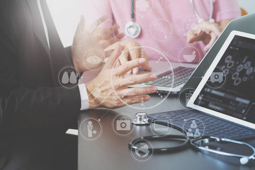 Medical co working concept,Doctor working with smart phone and digital tablet and laptop computer...