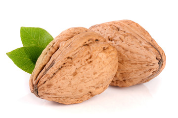 Walnuts with leaf isolated on white background