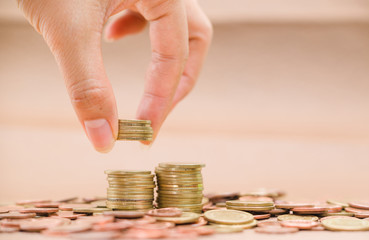 Pictures of Asian currencies are placed as layers,Focus on hands