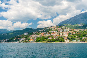 A sea yacht arrives to the city of Herceg Novi in Montenegro along the Adriatic Sea.