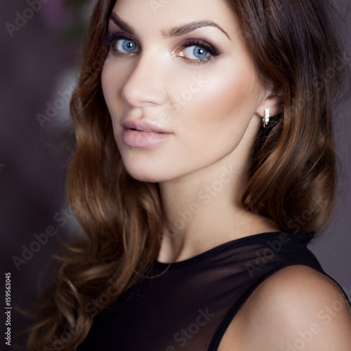 Beautiful sexy brunette with blue eyes. Portrait in the ... Beautiful sexy brunette with blue eyes Portrait in the