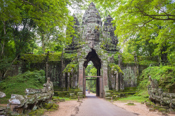 Fototapeta na wymiar Scenic jungle view of the Angkor Thom North Gate at the Angkor Temple complex near Siem Reap, Cambodia
