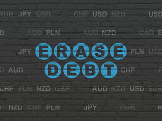 Finance concept: Erase Debt on wall background