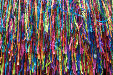 Wall of Fita do Bonfim Brazilian wish ribbons from the famous Igreja Nosso Senhor do Bonfim da Bahia church in Salvador, Bahia, Brazil