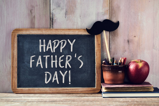 text happy fathers day in a chalkboard
