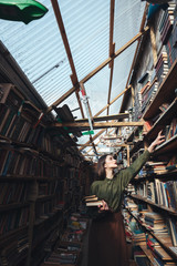 Vertical image of girl in library