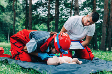 Cpr training on baby dummy