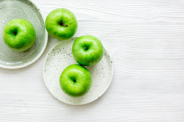 summer food with green apples on white background top view mock up