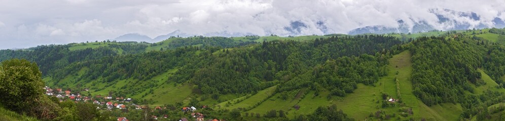 Fototapeta na wymiar Panorama with mountain scenery in Romania, Carpathian Mountains.