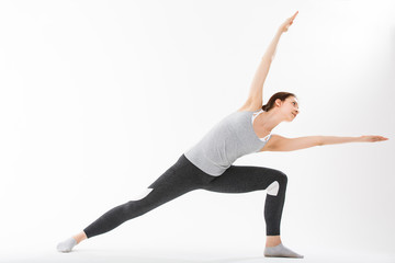 Naklejka premium Young woman exercise yoga supported headstand