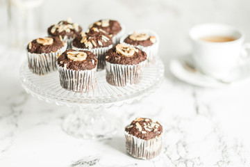Chocolate muffins with banana and tea