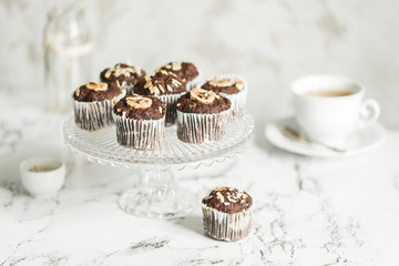 Chocolate muffins with banana and tea