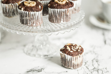 Chocolate muffins with banana and tea