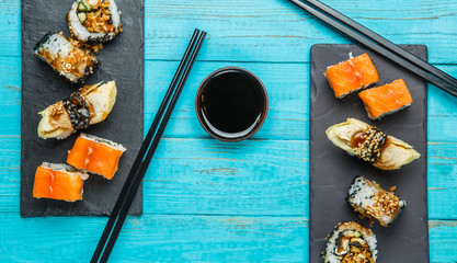 Sushi served at blue table