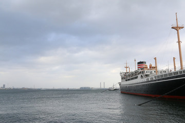 Large vessel on the sea on the rainy day