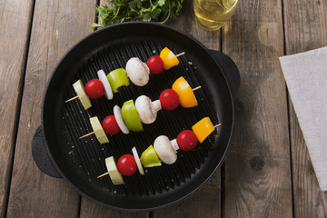 Grilled vegetables on skewers grill frying pan