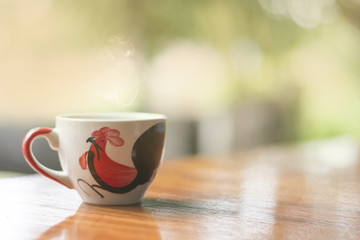 Morning coffee with old Thai style cup.